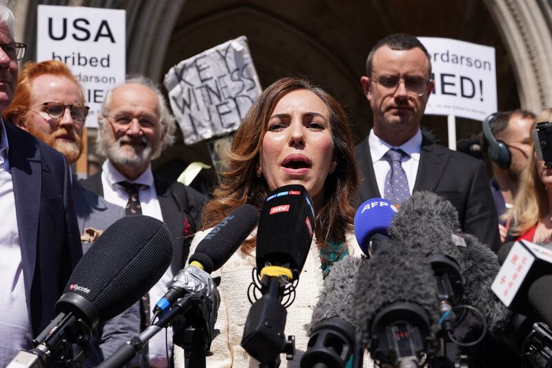 Julian Assange’s wife, Stella, gives a statement outside the Royal Courts of Justice in London after he won a bid to bring an appeal against his extradition to the US