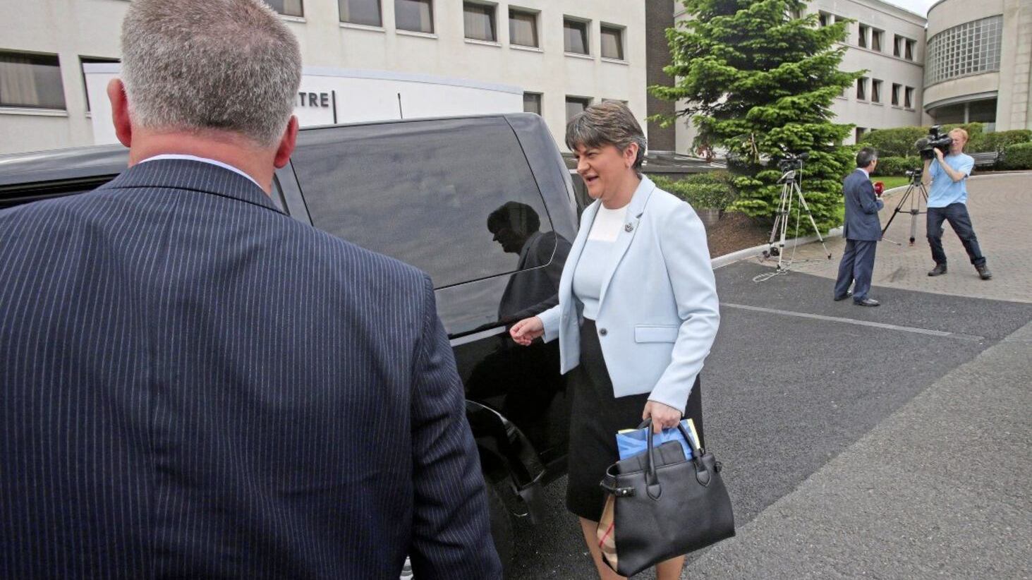 DUP leader Arlene Foster leaves the Stormont Hotel, the party will now go into a partnership government with the Conservatives. Picture Mal McCann. 