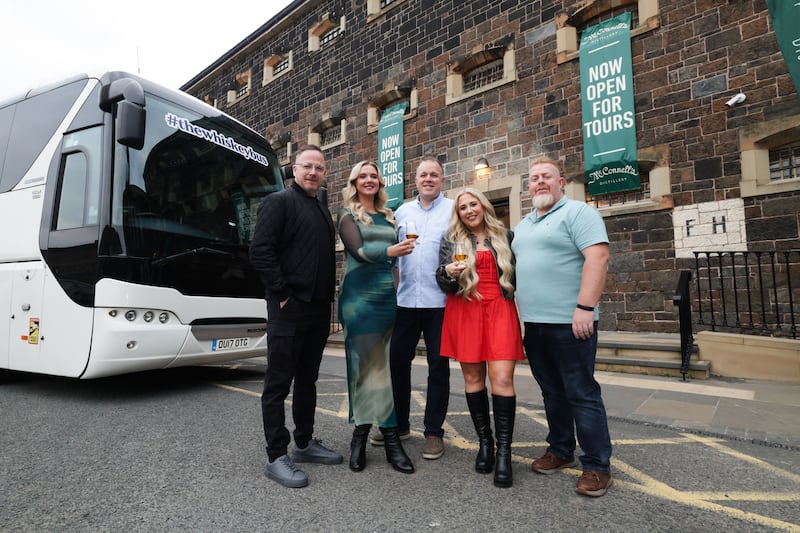 The Irish Whiskey Experiences team celebrate the arrival of their first international guests to Belfast.