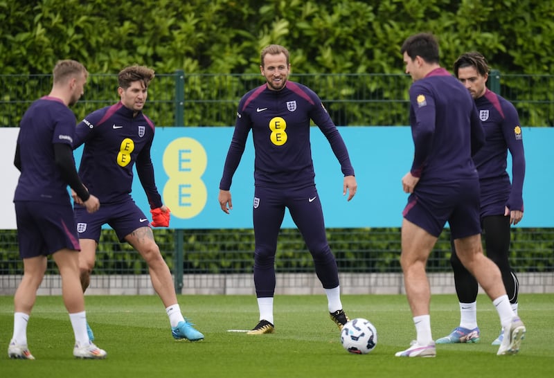 Captain Harry Kane (centre) is set to win his 100th cap on Tuesday evening