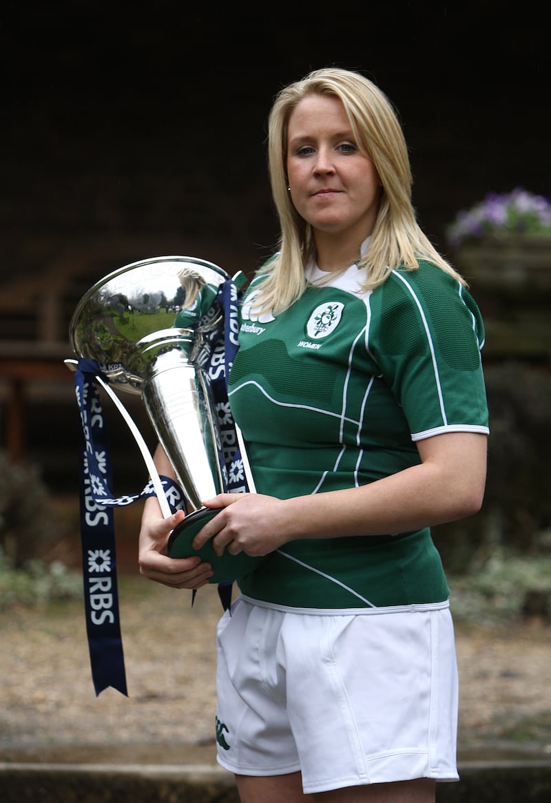 Ireland Women's captain Joy Neville poses with the 6 nations trophy