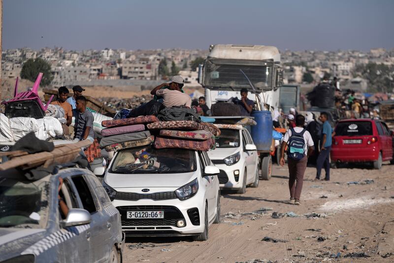 Palestinians flee the Khan Younis area of the Gaza Strip following Israeli military evacuation orders. (AP Photo/Abdel Kareem Hana)