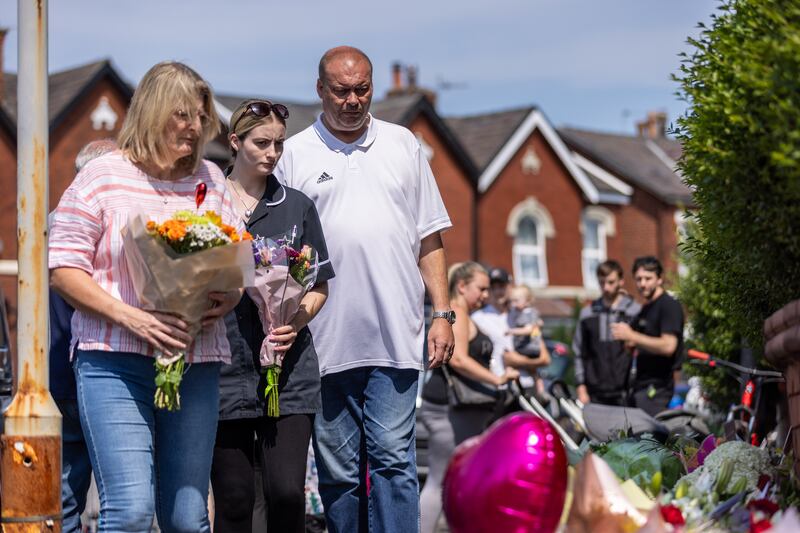 Residents have been laying flowers at the site of the attack in Southport, which happened on Monday