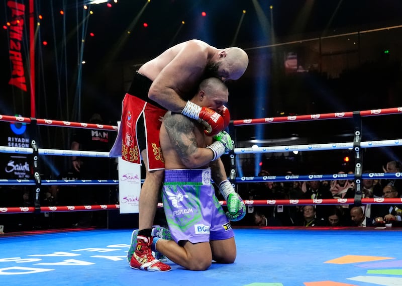 Tyson Fury and Oleksandr Usyk following the WBA, WBC, WBO, IBO World Heavyweight championship contest  at the Kingdom Arena in Riyadh, Saudi Arabi