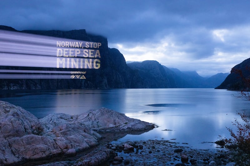 Greenpeace protests with a projection ‘Stop deep-sea mining’ in the Lysefjord in southern Norway. (Daniel Müller/Greenpeace)