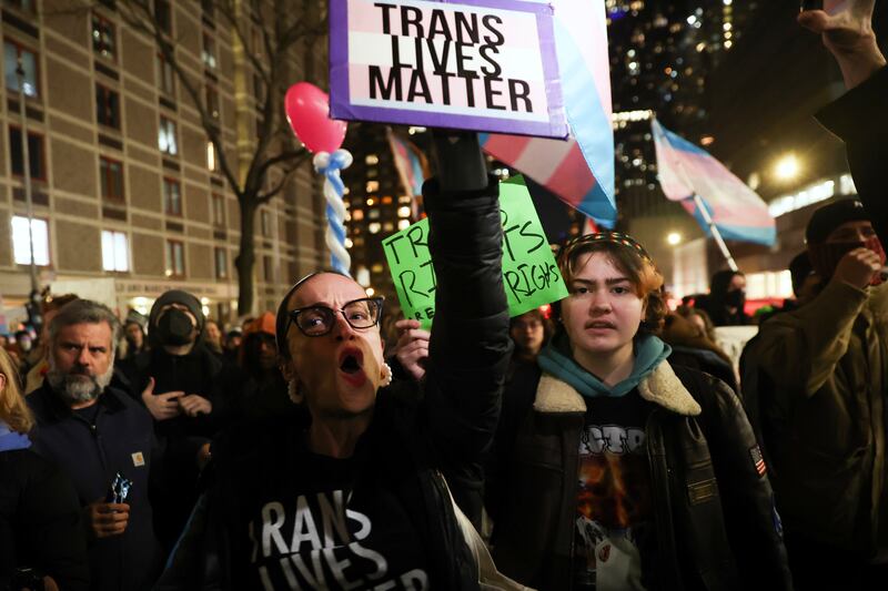 Protesters march during a rally demanding that NYU Langone commit to providing gender-affirming care for transgender youth (Heather Khalifa/AP)