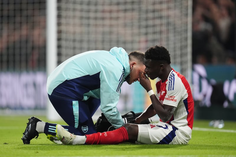 Bukayo Saka, right, is an injury doubt for England after going off against Chelsea