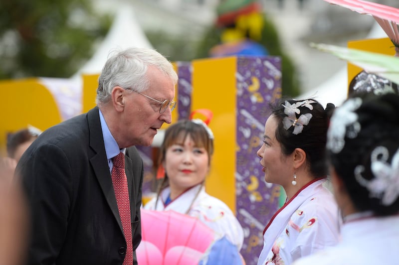 Sec of state Hilary Benn speaks to women in traditional Japanese clothing.  Belfast's diversity is celebrated with the launch of the Belfast Mela 2024.  Making it's way from writers square to Belfast City Hall.  Pictutres Mark Marlow