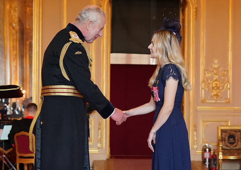 Lissie Harper was made an MBE by the King at Windsor Castle