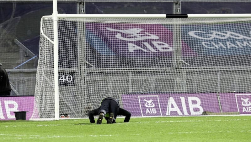 Mick Moran kisses the ground in front of Hill 16 following Kilcoo&#39;s All-Ireland triiumph at Croke Park on Saturday. Picture by Philip Walsh 