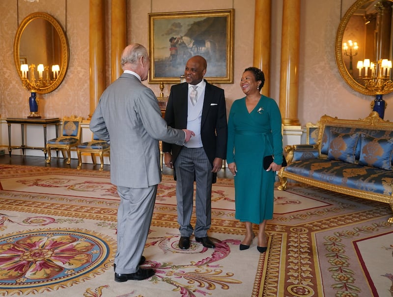 Charles chats with his guests at the Palace