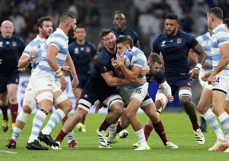 England’s Tom Curry, left, makes head on head contact with Argentina’s Juan Mallia which results in a red card