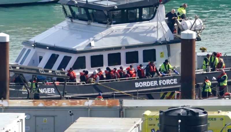 A group of people thought to be migrants are brought into Dover, Kent, by a Border Force vessel following a small boat incident in the Channel