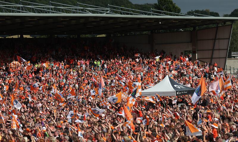 Armagh celebrate  with the fans at the Athletic grounds in Armagh on Monday, after winning the All Ireland.
PICTURE COLM LENAGHAN