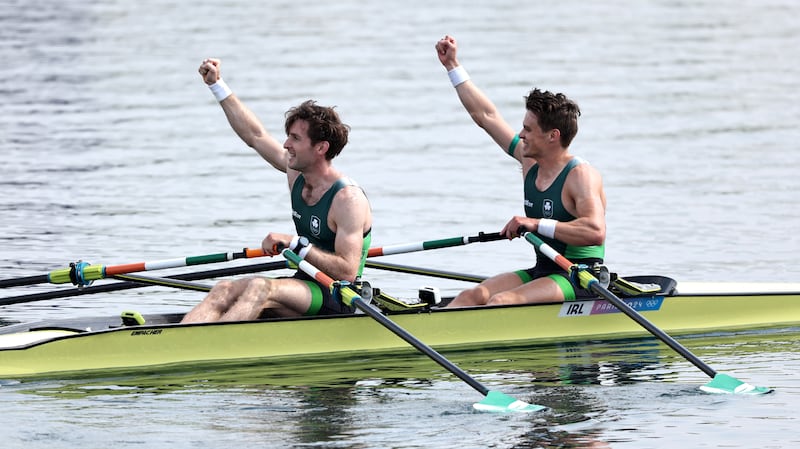 PARIS, FRANCE - AUGUST 02: Fintan McCarthy and Paul O'Donovan of Team Ireland celebrate winning the gold medals after competing in the Rowing Lightweight Men's Double Sculls Final A on day seven of the Olympic Games Paris 2024 at Vaires-Sur-Marne Nautical Stadium on August 02, 2024 in Paris, France. (Photo by Francois Nel/Getty Images)