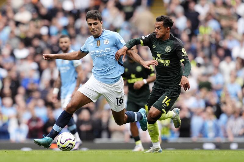 Rodri (left) and Brentford’s Fabio Carvalho battle for the ball during Manchester City’s 2-1 Premier League win on Saturday