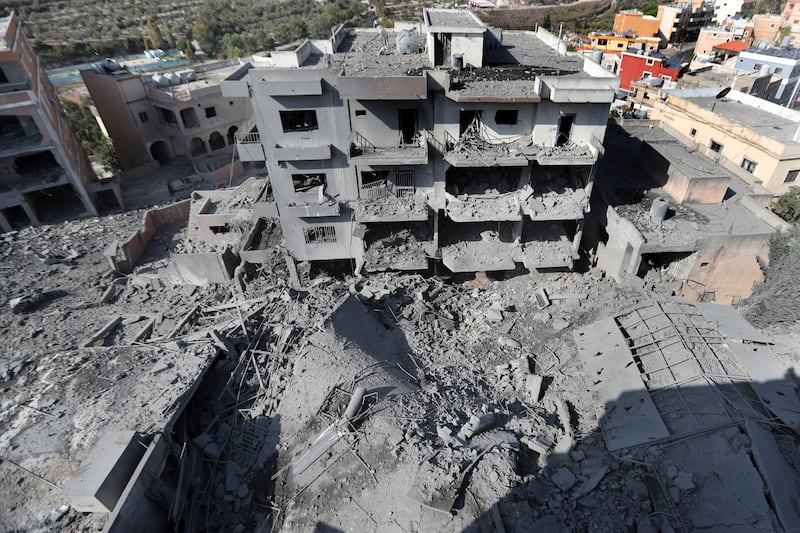 Destroyed buildings that were hit by Israeli air strikes in Qana, south Lebanon (Mohammed Zaatari/AP)