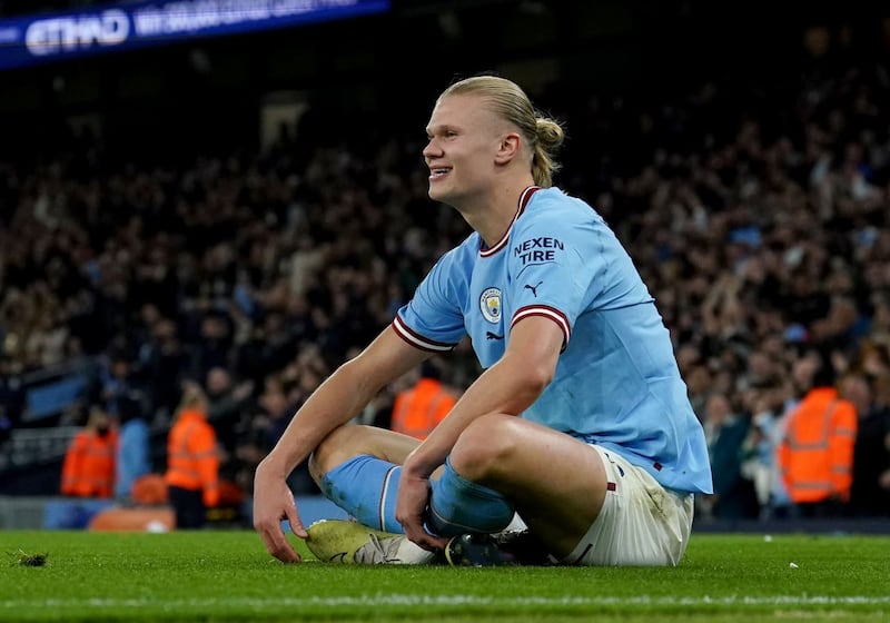 Erling Haaland celebrates his record-breaking 35th goal of the Premier League season against West Ham