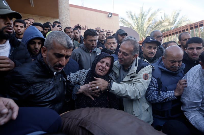 Relatives of the Al Jazeera cameraman, Samer Abu Daqqa, who was killed by an Israeli airstrike, mourn his death, during his funeral in the town of Khan Younis (AP Photo/Mohammed Dahman)