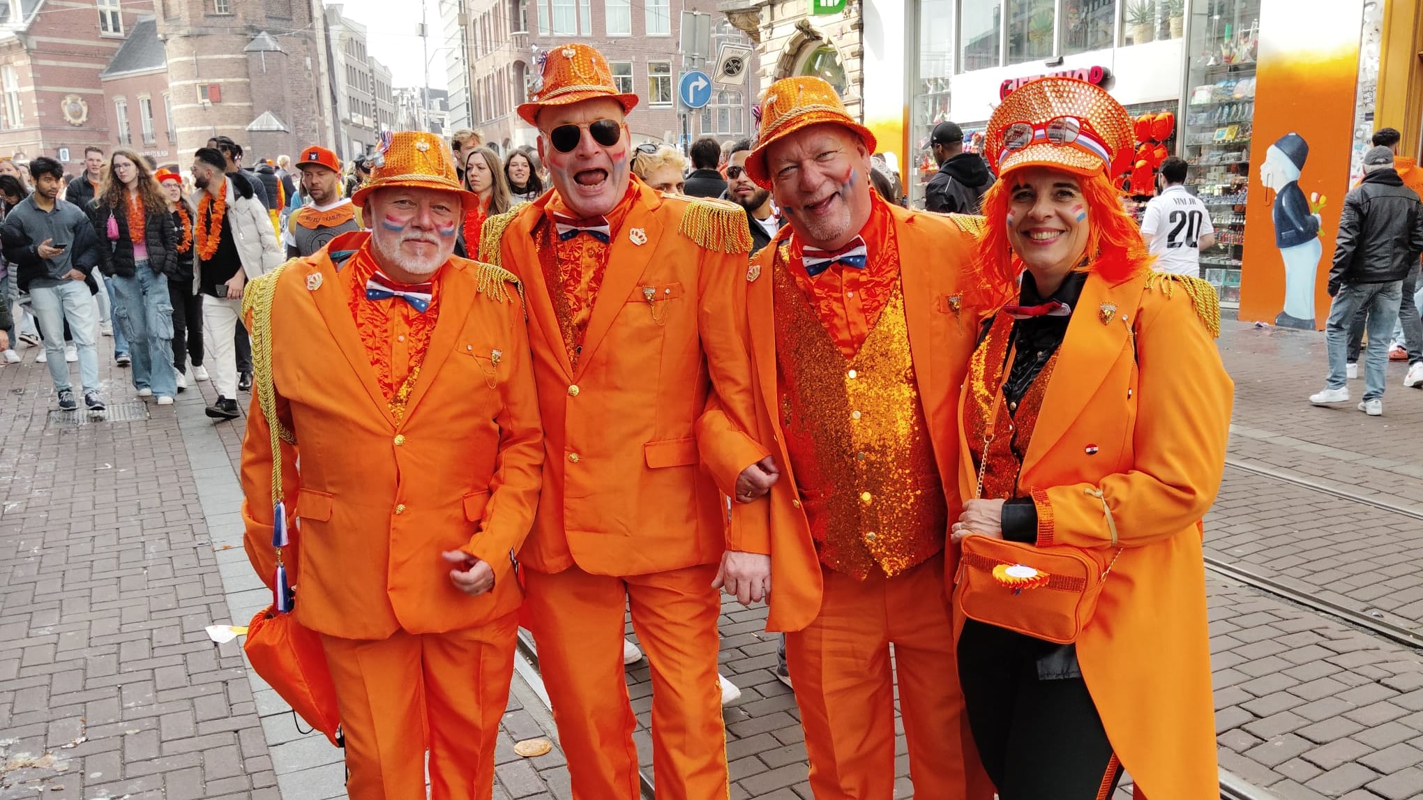 Revellers in Amsterdam decked out in Orange as part of the annual King's Day celebrations. PICTURE: PEDRO DONALD