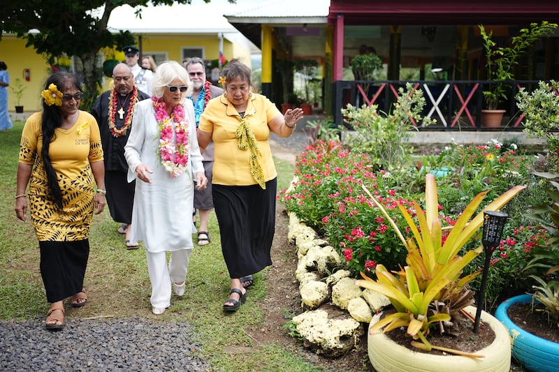 Camilla is given a tour during her visit to the Samoa Victim Support Group