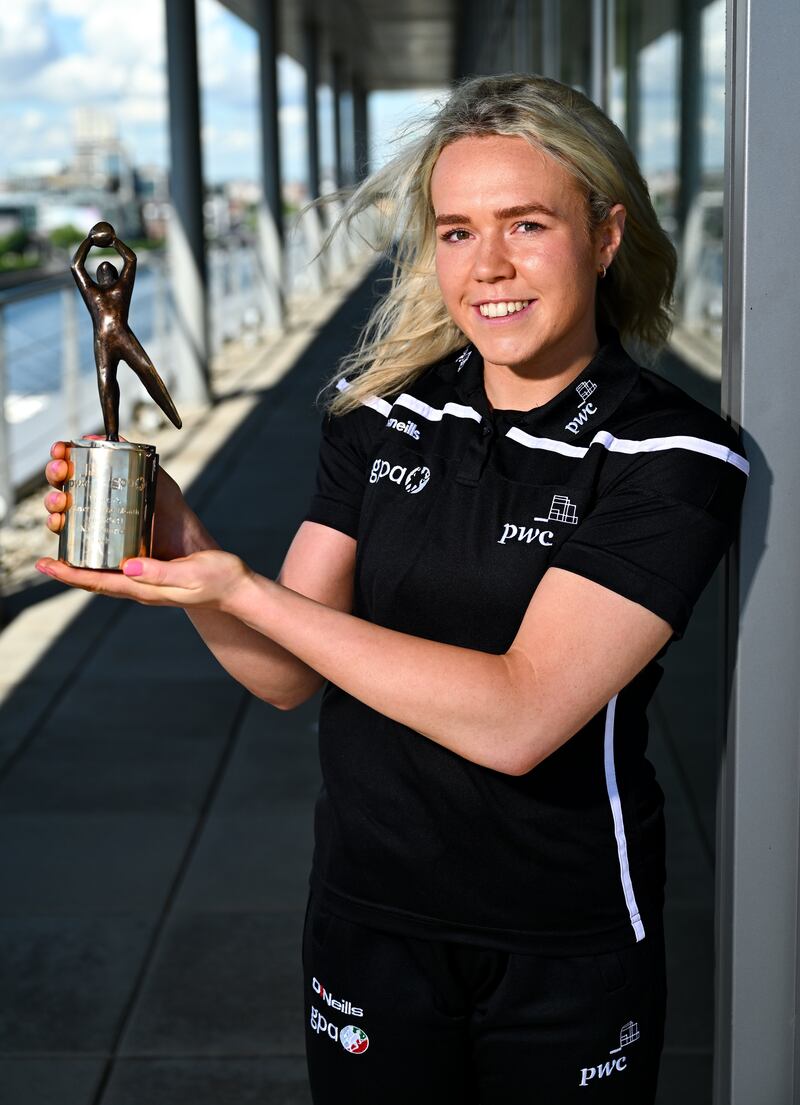 PwC GPA Player of the Month for July in ladies' football, Katie Quirke of Cork, with her award