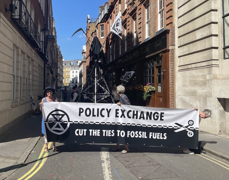 Extinction Rebellion protesters outside the offices of think tank Policy Exchange on Old Queen St, Westminster