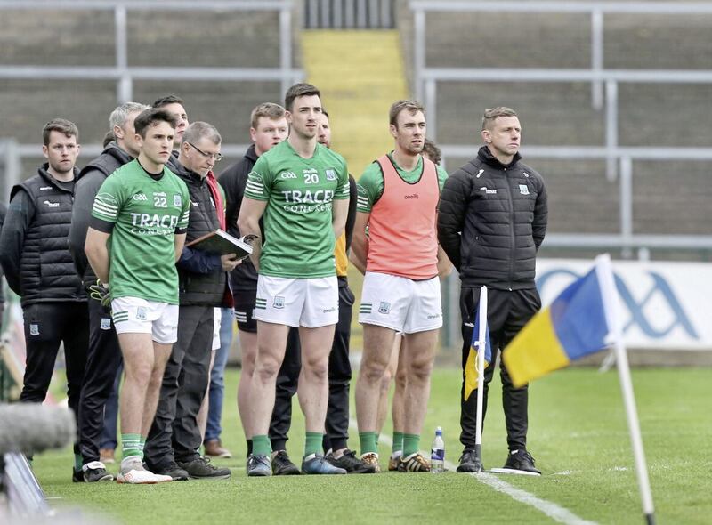 Fermanagh manager Kieran Donnelly on the line with substitutes during the national anthem before taking on Derry in the Ulster SFC quarter final. Picture: Margaret McLaughlin.