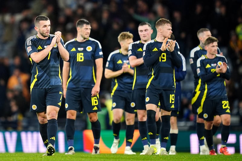 John McGinn’s (left) late goal earned victory on Friday night