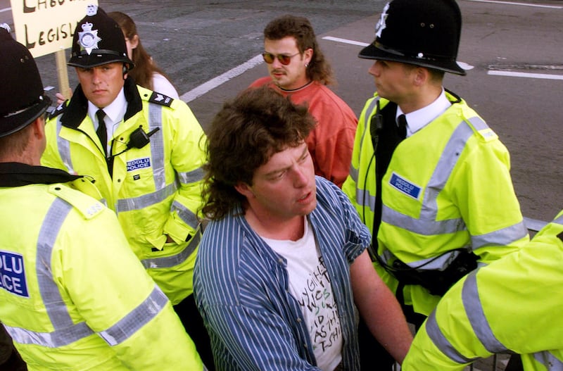 Craig Evans being led away by police in 2001