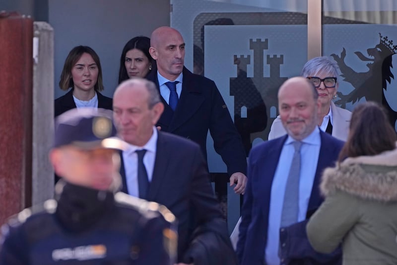 Luis Rubiales, top, leaves the court (Manu Fernandez/AP)