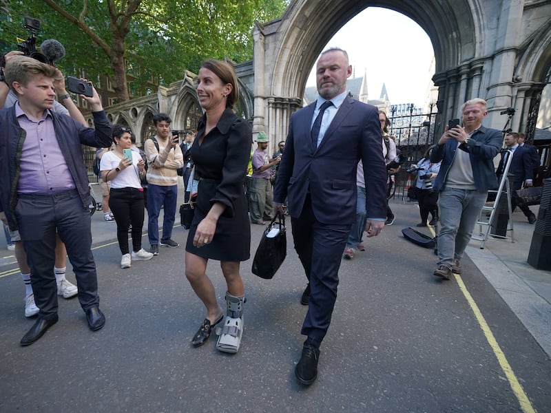 Coleen and Wayne Rooney leaves the Royal Courts Of Justice after a hearing in 2022