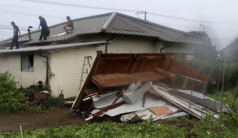 A house is seen damaged as the typhoon approaches in Miyazaki, Miyazaki prefecture, western Japan (Kyodo News via AP)