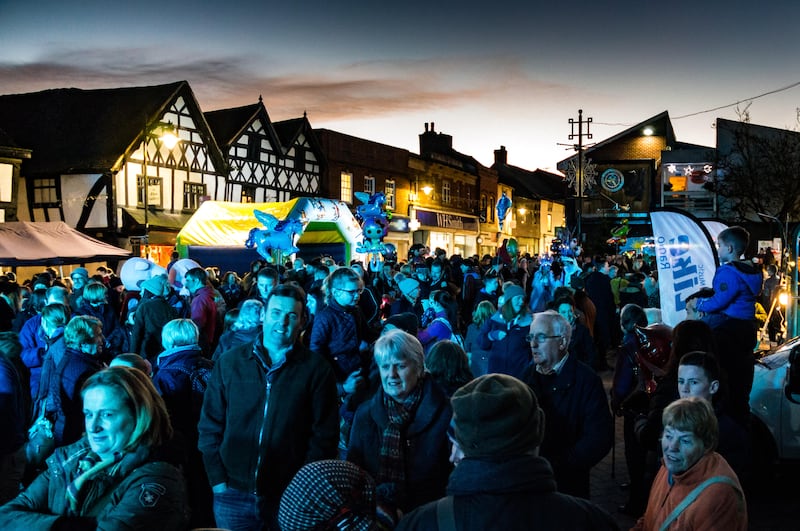 Performers entertain festive crowds gathered in Corn Square