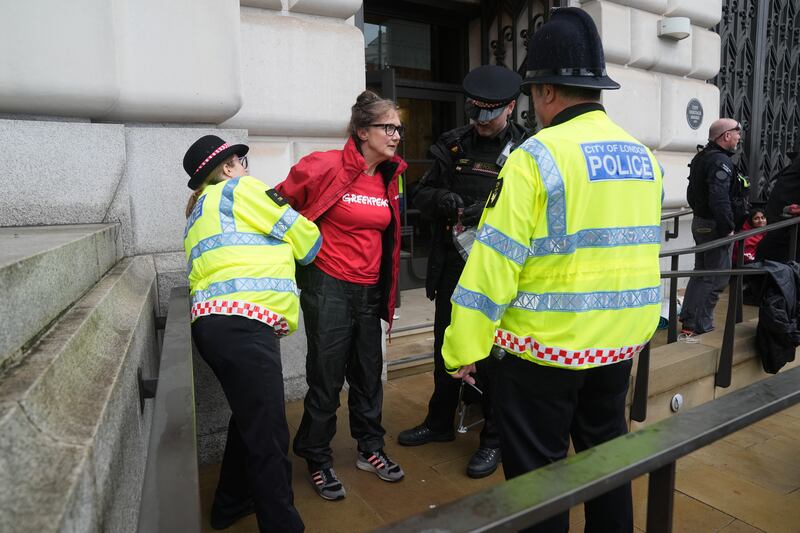 Police remove activists outside Unilever’s headquarters