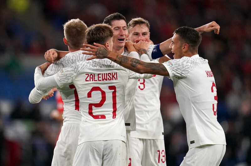 Poland players celebrate during their sixth successive victory over Wales, a 2022 Nations League game in Cardiff