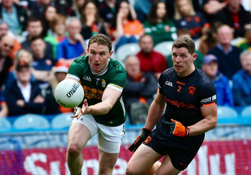 Kerry defender Tadhg Morley plays the ball away against Armagh.