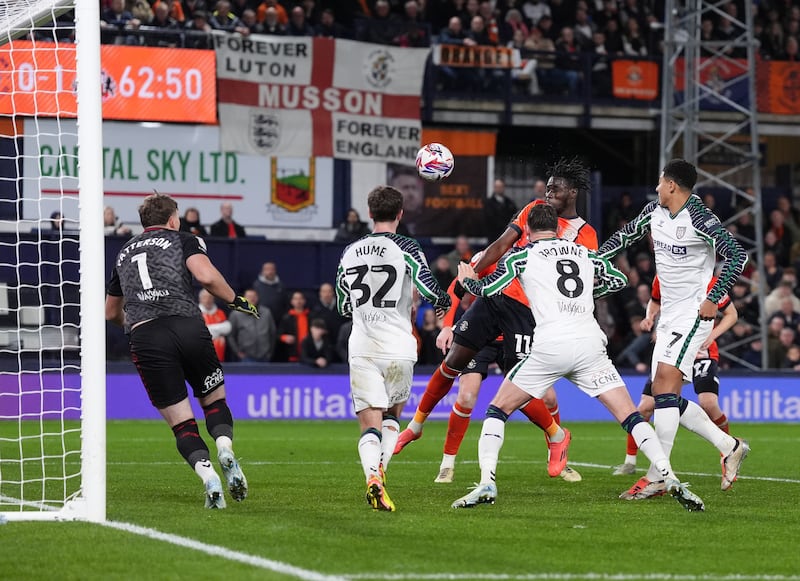 Elijah Adebayo, centre right, scores against Sunderland