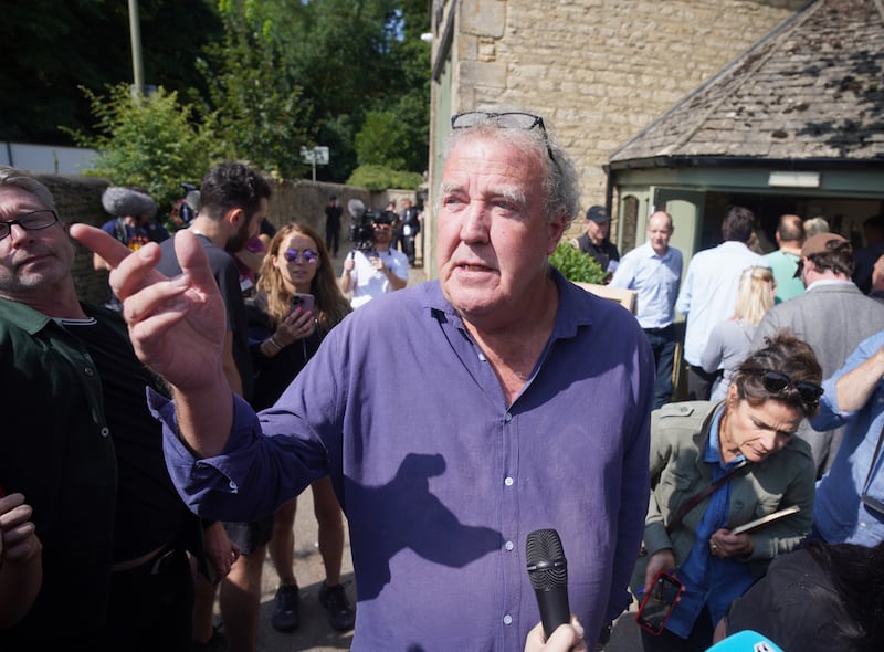 TV presenter turned farmer Jeremy Clarkson speaks to reporters outside his new pub, The Farmer’s Dog, in Oxfordshire