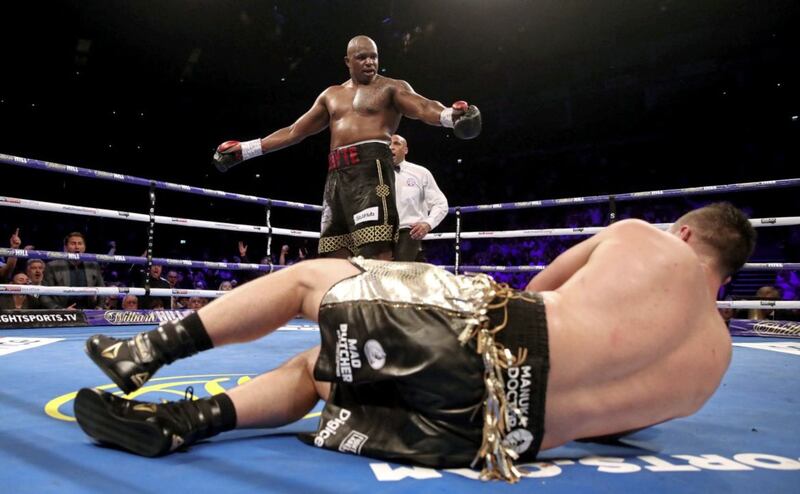 Dillian Whyte floors Joseph Parker during their prior to his WBC Silver Heavyweight title and WBO International Heavyweight title at the O2 Arena on Saturday night 