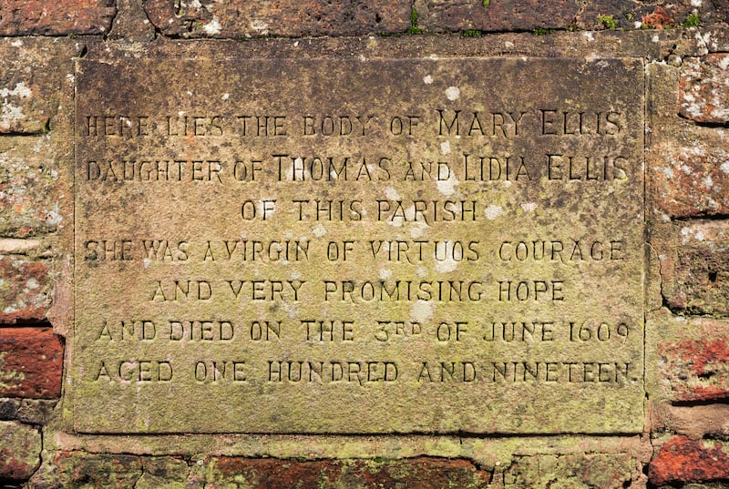 Detail of a 1970s carved plaque on the side of Mary Ellis’ tomb in St Clement’s churchyard. (Historic England)