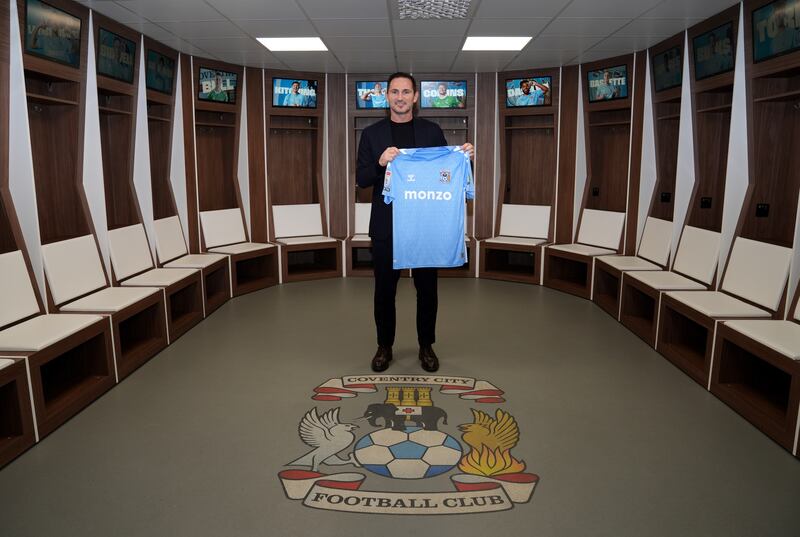 Coventry’s new manager Frank Lampard poses in the home changing room