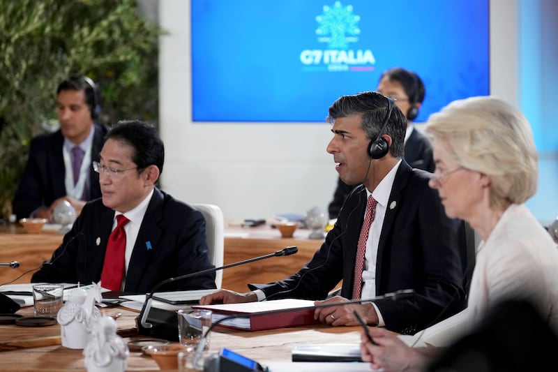 Japanese Prime Minister Fumio Kishida, British Prime Minister Rishi Sunak and European Commission President Ursula von der Leyen attend a roundtable session entitled Africa, Climate Change And Development at the G7 summit (Christopher Furlong/Pool/AP)