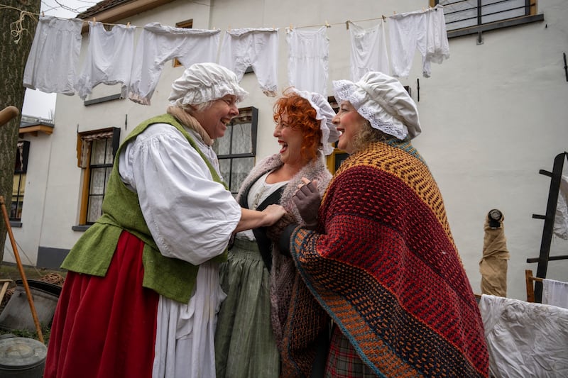 People in costume take part in the Dickens festival (Peter Dejong/AP)