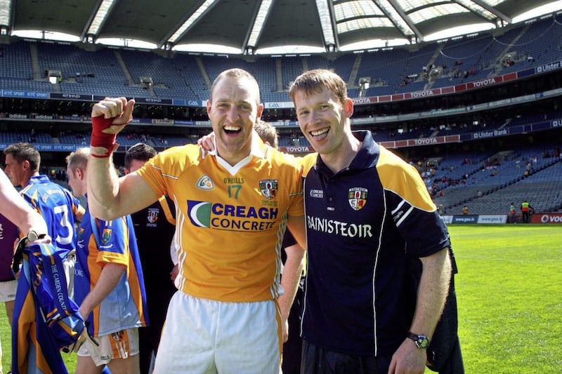 Joe Quinn celebrates with Antrim manager Jody Gormley after winning the Tommy Murphy Cup at Croke Park in 2008. Picture by Seamus Loughran 