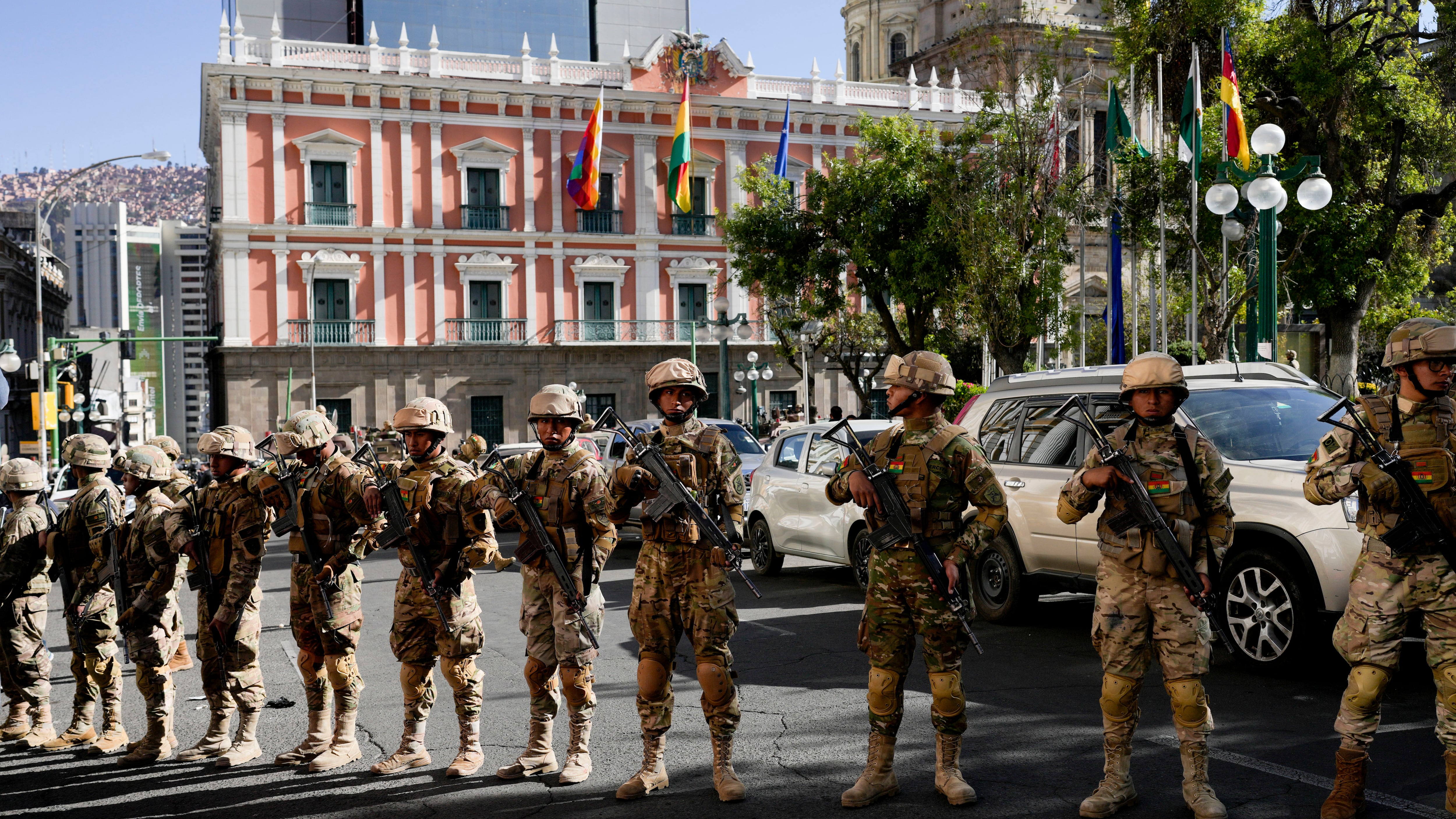 Soldiers stand guard outside the presidential palace in La Paz, Bolivia (Juan Karita/AP)