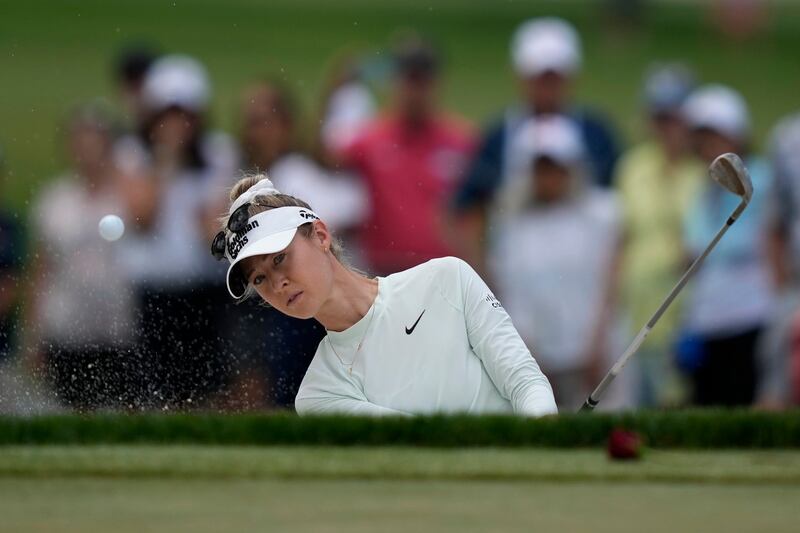 Nelly Korda hit out of a bunker on the first hole during a practice round for the US Women’s Open at Lancaster Country Club (Matt Rourke/AP)
