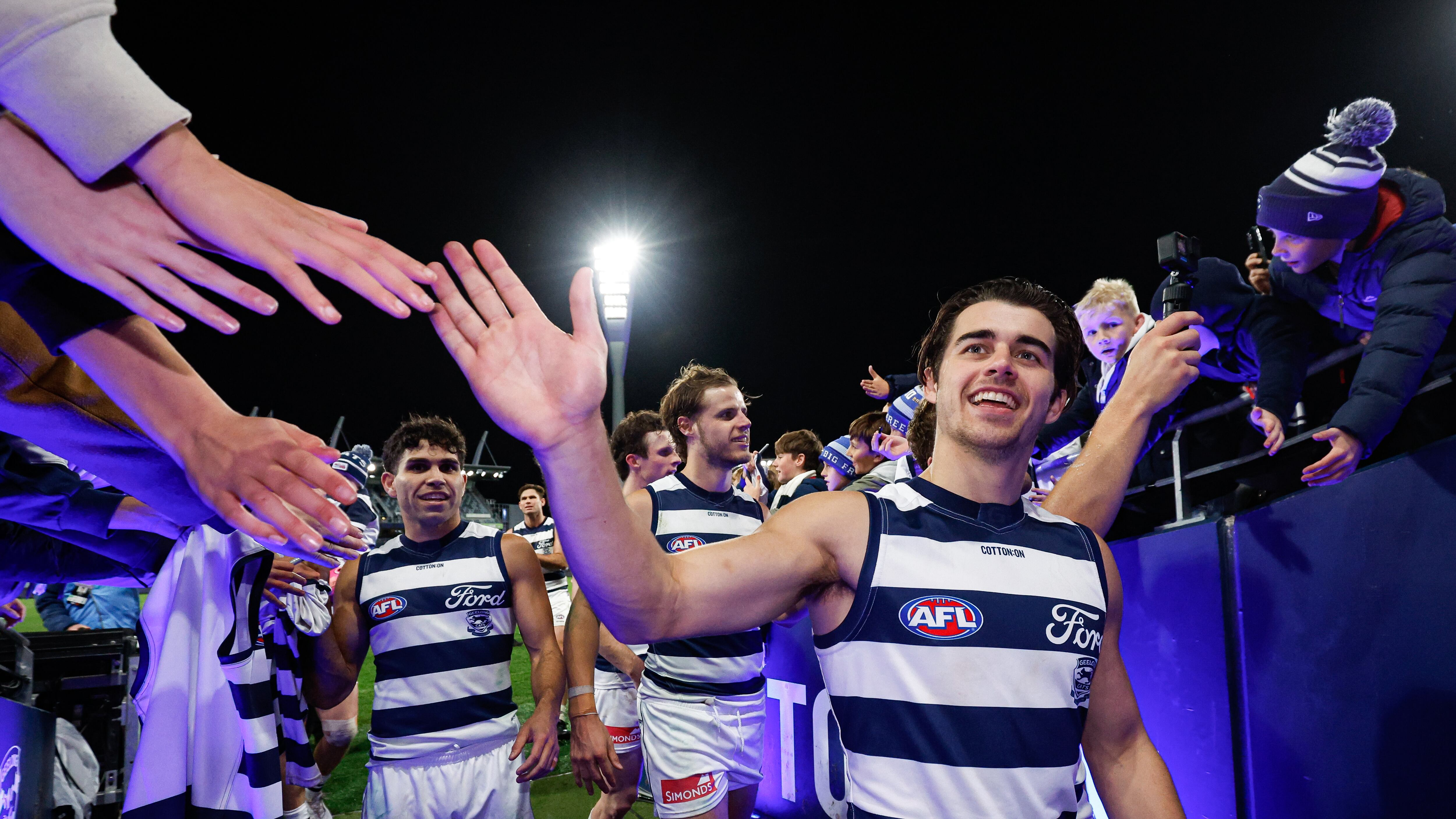 MELBOURNE, AUSTRALIA - JUNE 01: Oisin Mullin of the Cats leaves the field after a win during the 2024 AFL Round 12 match between the Geelong Cats and the Richmond Tigers at GMHBA Stadium on June 01, 2024 in Melbourne, Australia. (Photo by Dylan Burns/AFL Photos via Getty Images)