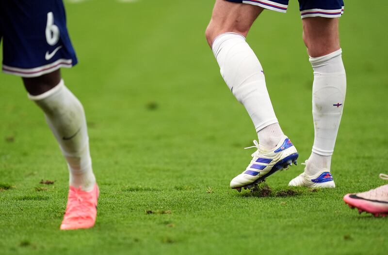 England and Denmark players had to contend with a poor pitch at the Frankfurt Arena