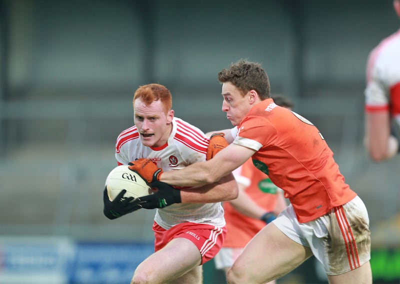 Armagh's Charlie Vernon with Conor McAtamney of Derry during Sunday's Dr McKenna Cup match at the Athletic Grounds, Armagh Picture by Margaret McLaughlin